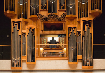 Organist playing the pipe organ